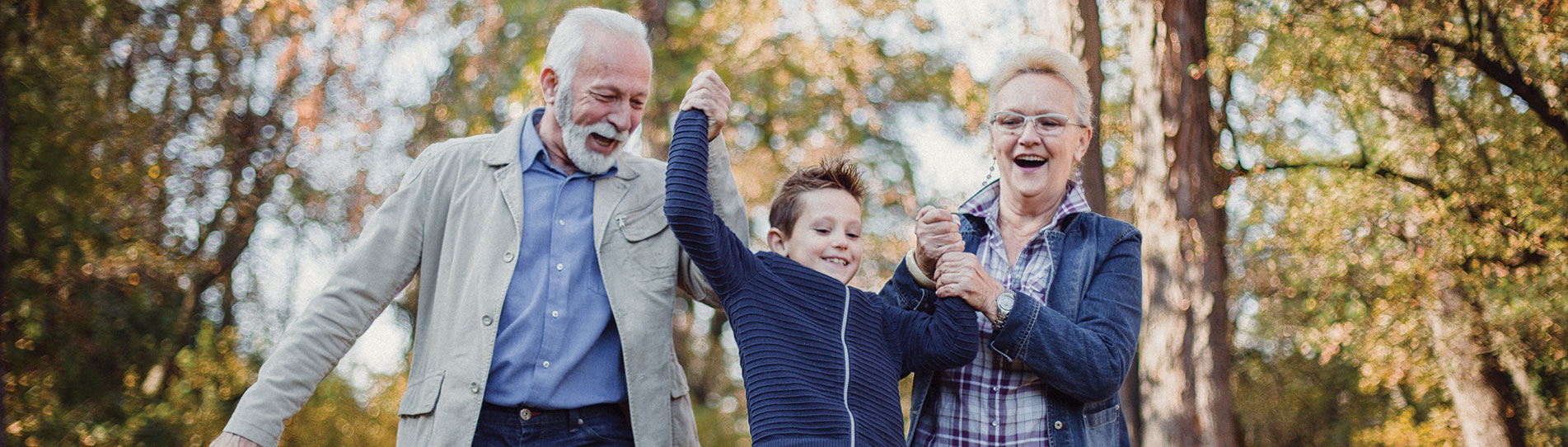 grandparents in park with grandson.jfif