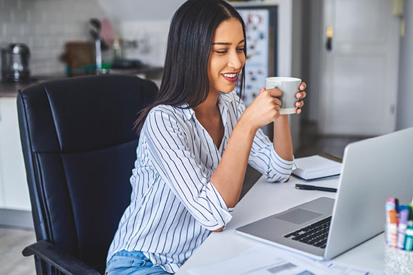 woman working from home with laptop