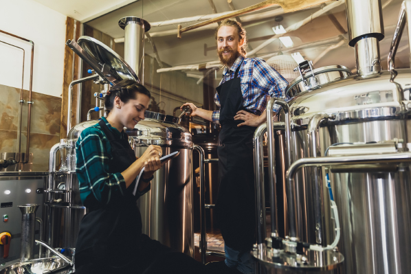 two employees in brewery