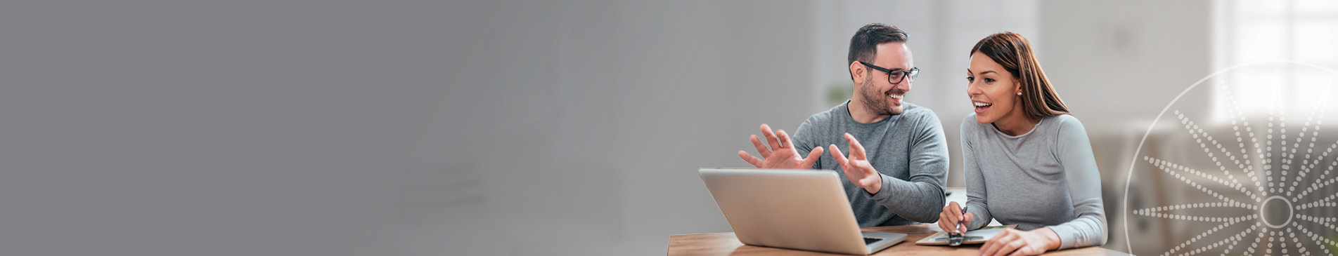 a couple using laptop